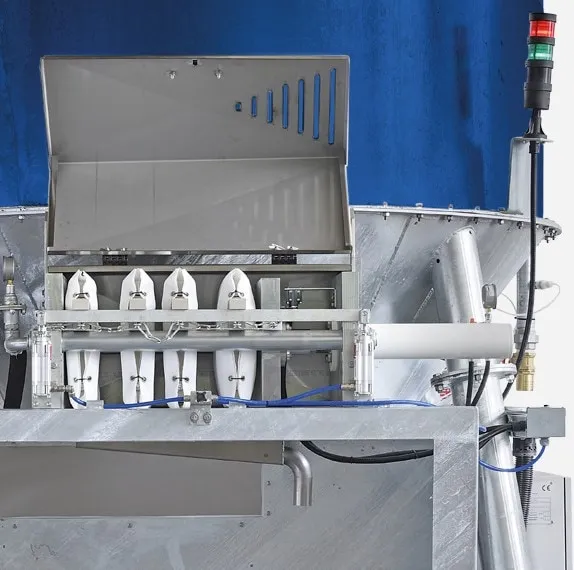 Mini Compact M 2.1 — Hot-dip galvanized filter press with stainless steel cover and drainage channel.